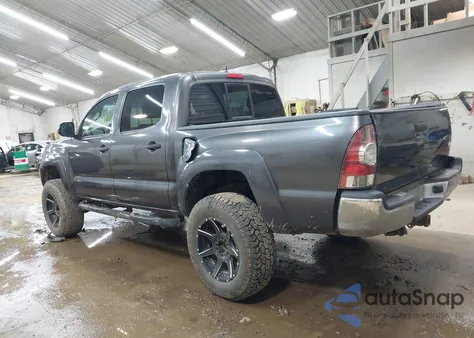 2015 Toyota Tacoma Base V6 z USA, uszkodzony, nr VIN 3TMLU4EN9FM206890